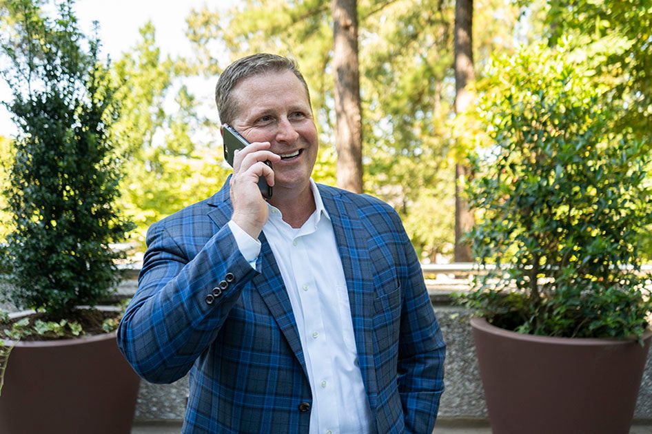 Jason is on the phone with clients