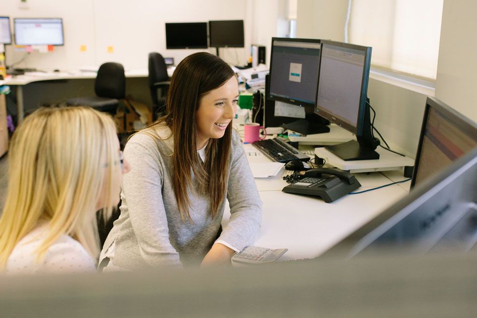 Ipsum employees helping each other
