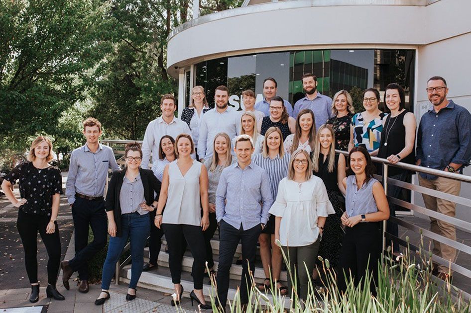 Group photo of workers from Ipsum