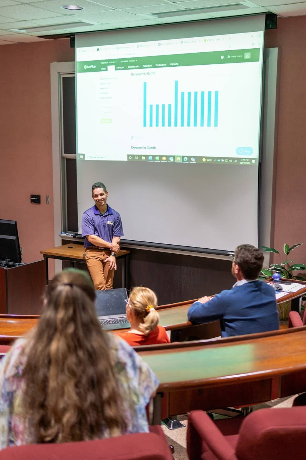 College professor presents financial forecasts to students using LivePlan.