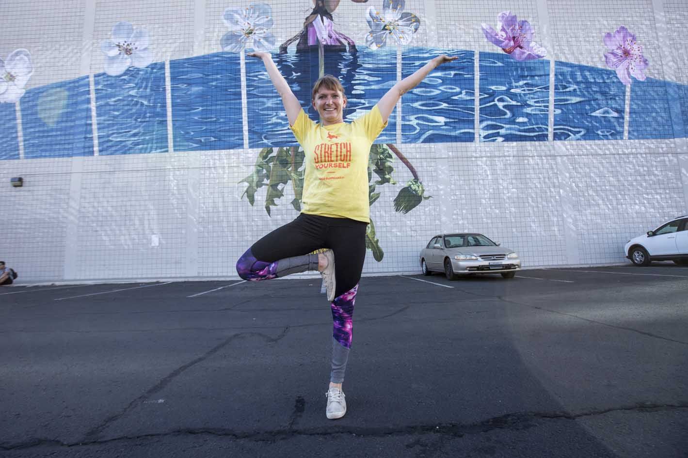 Image of Allison striking a tree pose