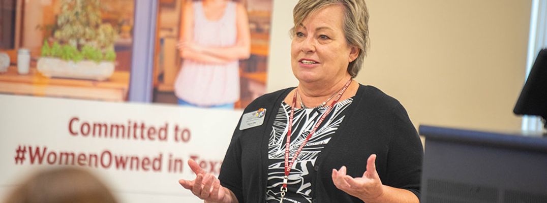 Tracy Irby, Director of the Center for Women Entrepreneurs at Texas Woman’s University, speaking to an entrepreneurship class.