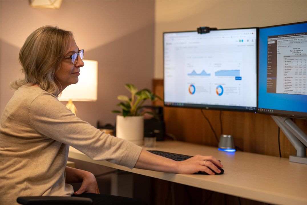 Kids First Finance Director Megan Jones using LivePlan's forecasting features to explore different scenarios
