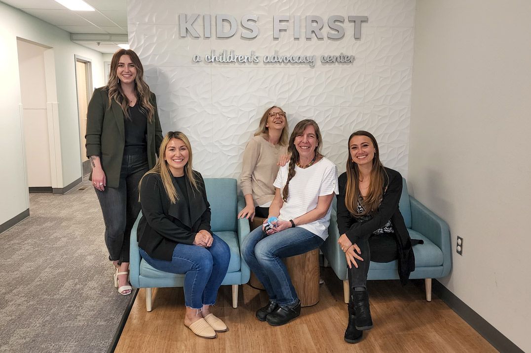 The entire Kids FIRST team together in office